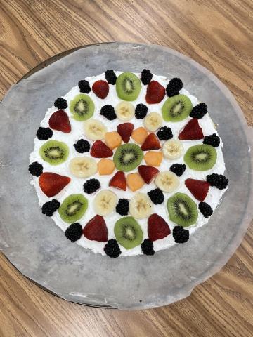 A delicious looking fruit pizza 