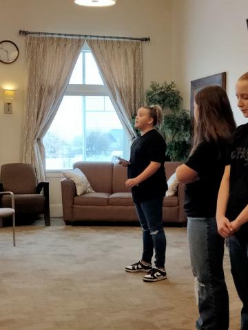 Londyn sings at Assisted Living Center