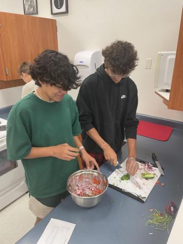 students cut veggies 